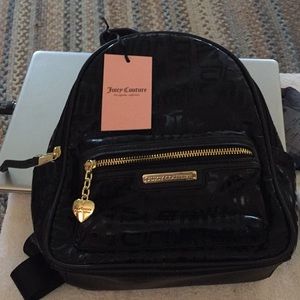 Juicy Couture mid backpack in black w heart charm